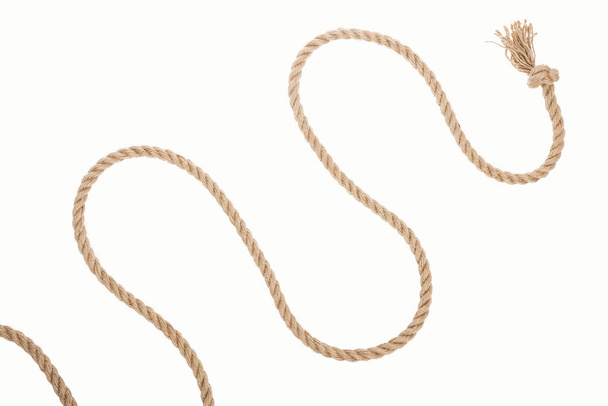 corda marrom e ondulada com nó isolado em branco
  - Foto, Imagem