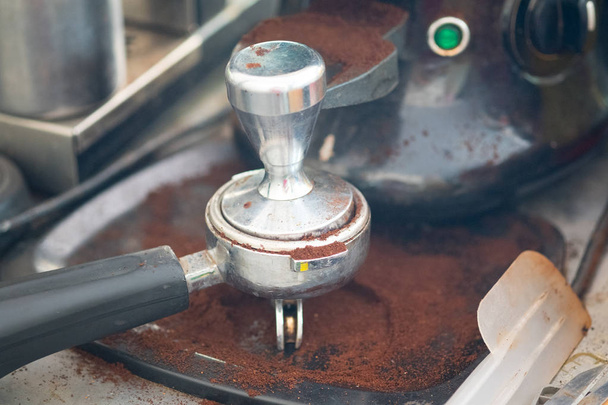 Espresso shot from coffee machine in coffee shop, Coffee maker in coffee shop - Фото, изображение