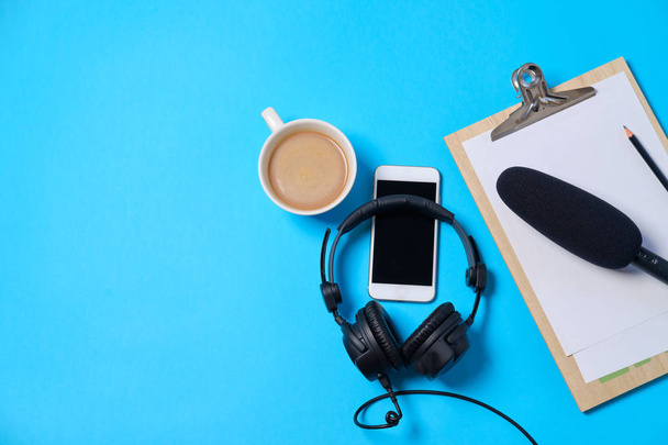 Music or podcast background with headphones, microphone, coffee  - Foto, Bild