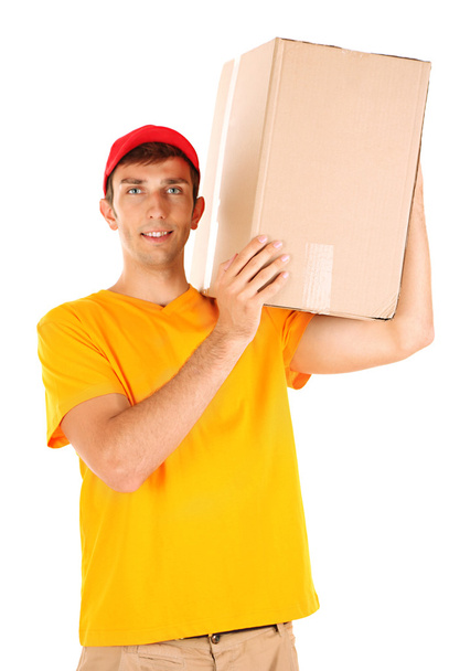 Young delivery man holding parcel, isolated on white - Foto, Imagem