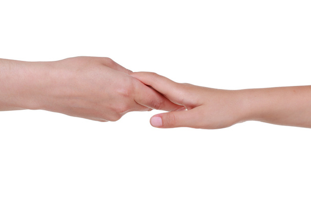 Two caucasians hands holding each other - 写真・画像