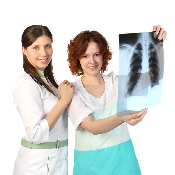 Two smiling nurses with X-ray - Valokuva, kuva