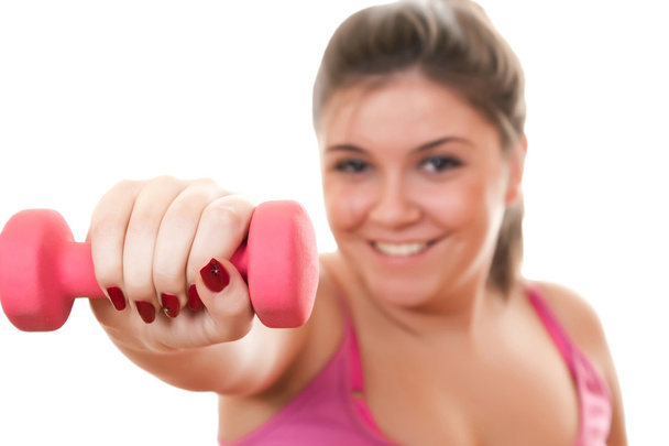 Young girl holding weight for exercise - Foto, Imagen