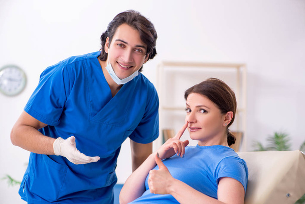 Woman visiting male doctor for plastic surgery - Photo, Image