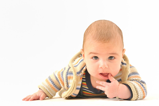 A cute baby boy on white background - Foto, imagen