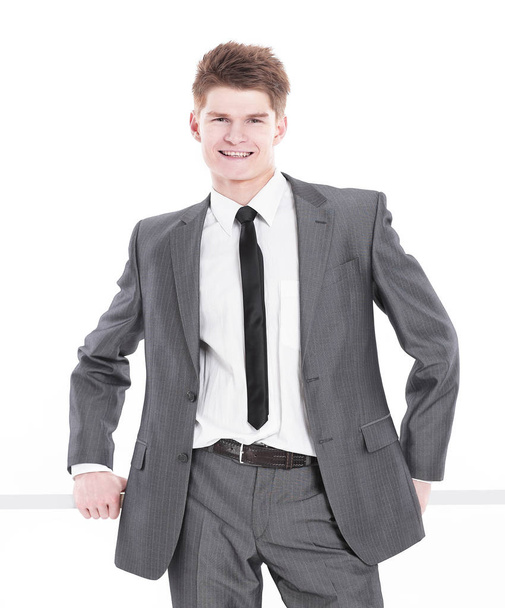 young businessman drawing on white wall.isolated on a white - Fotografie, Obrázek