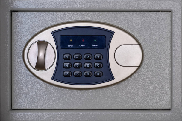 Safe box with combination lock. Money storage concept. Financial service in a bank or hotel. - Photo, Image