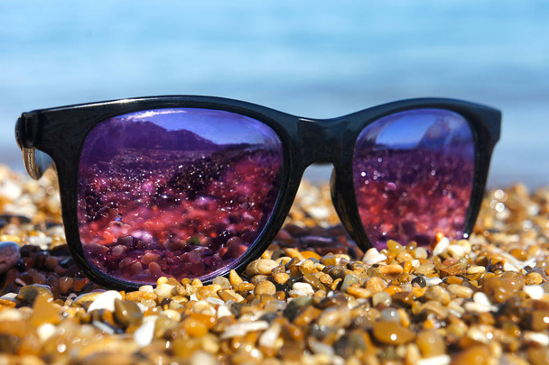 sunglasses on the beach - Photo, Image