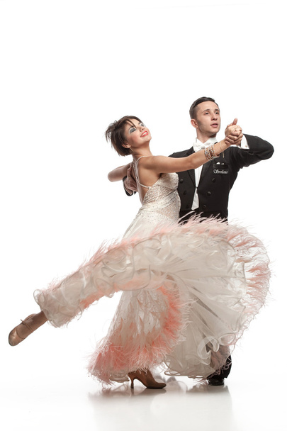 beautiful couple in the active ballroom dance - Foto, Imagen