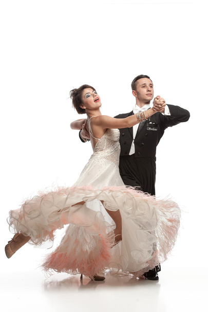 beautiful couple in the active ballroom dance - Foto, Imagen