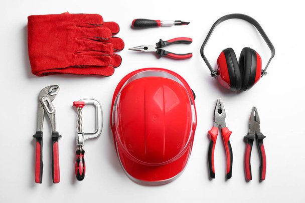 Flat lay composition with different construction tools on white background - Φωτογραφία, εικόνα