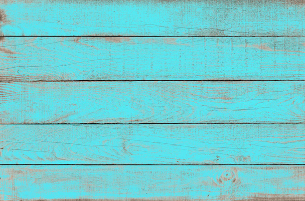 Old weathered wooden plank painted in turquoise blue color. Vintage beach wood background. - Photo, Image