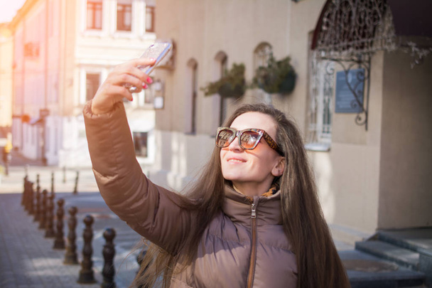 selfie woman urban cityscape - Фото, изображение