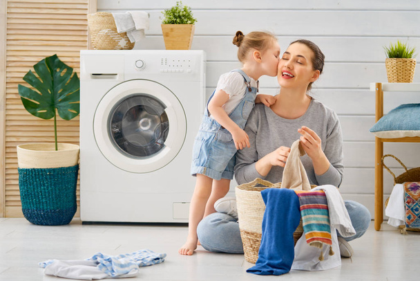 family doing laundry - Φωτογραφία, εικόνα