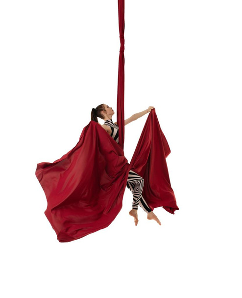 Woman in striped body hanging on cloth - Φωτογραφία, εικόνα