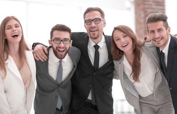 cheerful business team standing in the office - Φωτογραφία, εικόνα