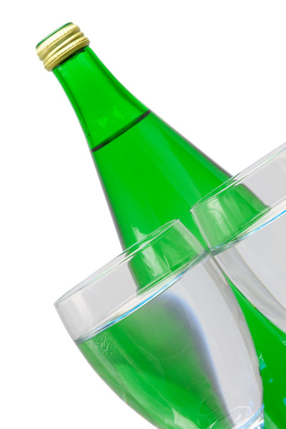 Green bottle and glass of water - Foto, immagini