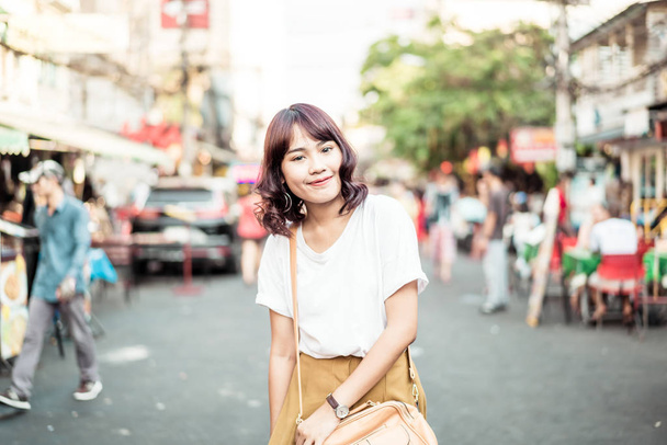 Happy and Beautiful Asian woman traveling at Khao Sarn Road, Tha - Fotó, kép