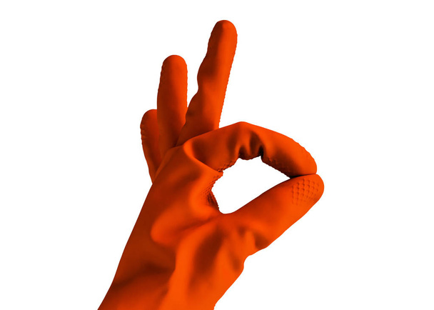 hand in rubber orange glove shows ok sign, isolated object on white background . cleaning concept - Φωτογραφία, εικόνα