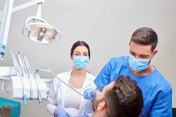 Dental treatment in a clinic - Fotó, kép