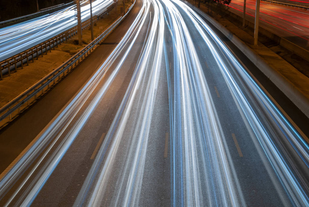 Top view of white traffic wakes from a bridge in the city of Madrid, Spain - Fotografie, Obrázek