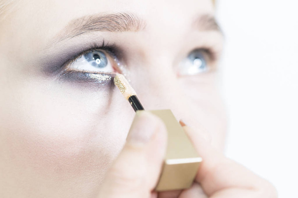 Makeup close up. Eye makeup in the studio - Foto, Bild