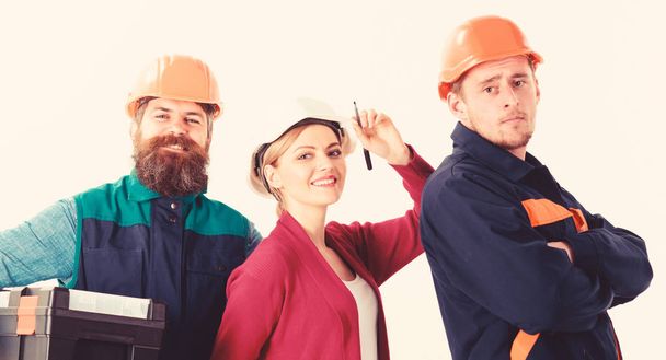 Cheerful team of architects ready to work, isolated white background. - Foto, imagen