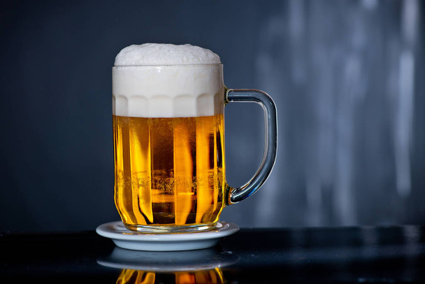 Glass of beer with drops of water - Fotoğraf, Görsel