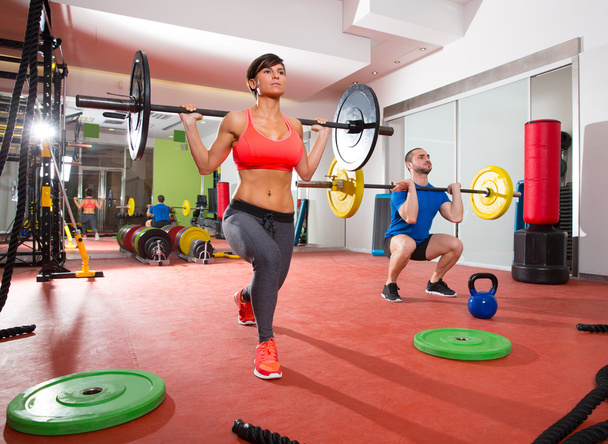 Crossfit fitness gym weight lifting bar group - Фото, изображение
