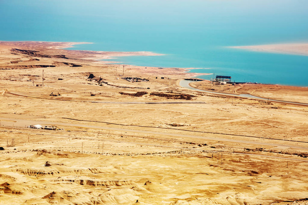 View from the Masada on the desert on a sunny day - Φωτογραφία, εικόνα
