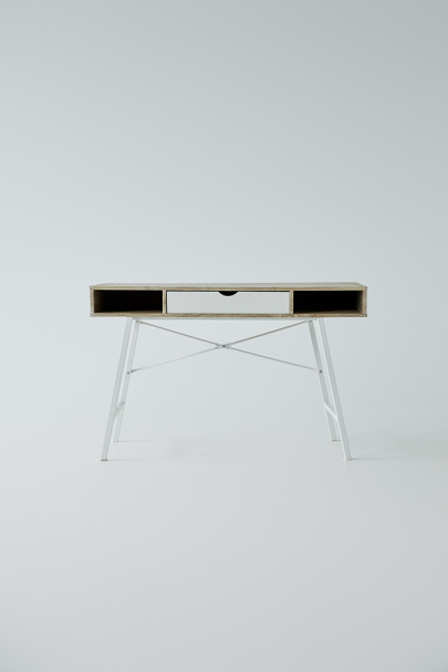modern table with shelves on grey background with copy space - Photo, Image