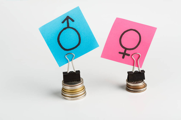 Ilustracja płci w wynagrodzeniach z kolorowych naklejek - Zdjęcie, obraz