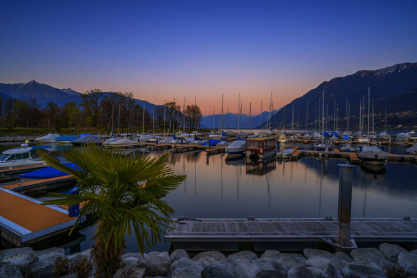 Violet sunset in the port of Ascona, Switzerland - Photo, Image