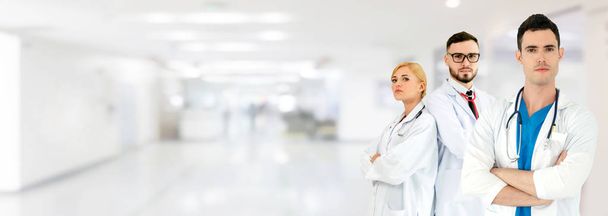 Doctor working in hospital with other doctors. - Фото, изображение