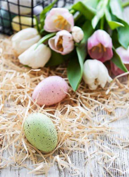 Easter eggs and tulips bouquet - Foto, Bild