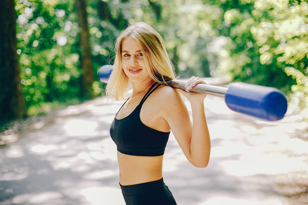Sports girl in a park - Photo, image