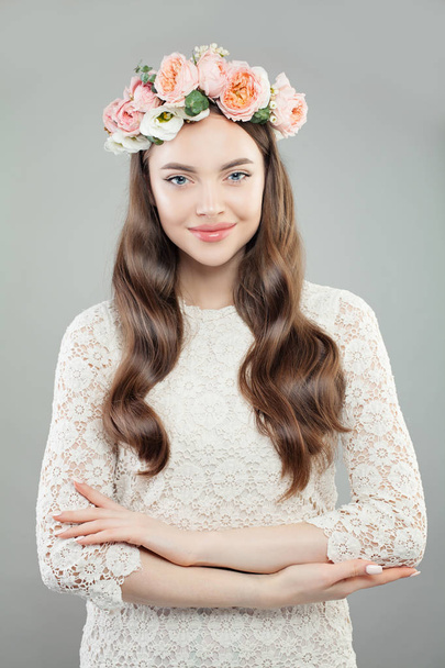 Beauty Fashion Portrait of Beautiful Model Woman in White Lacy Dress and Flowers Wreath - Фото, зображення