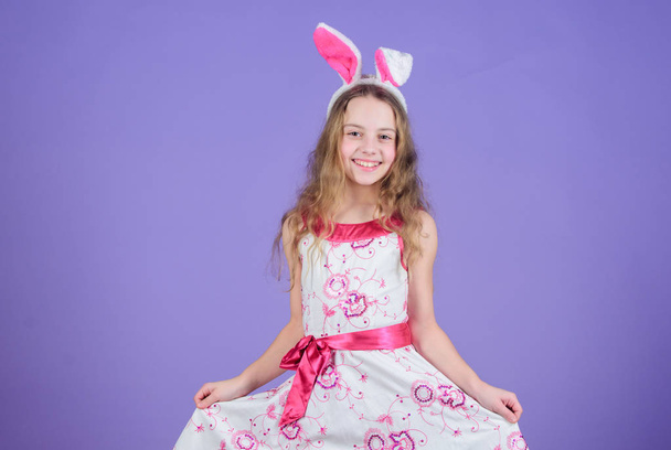Adorable cutie. Easter bunny is symbol of Easter. Small girl in bunny headband for Easter celebration. Little girl wearing bunny ears. Easter bunny concept - Fotografie, Obrázek