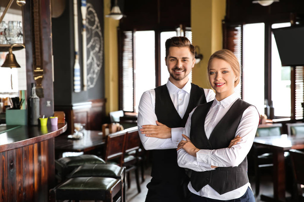 Young waiters in restaurant - Photo, Image