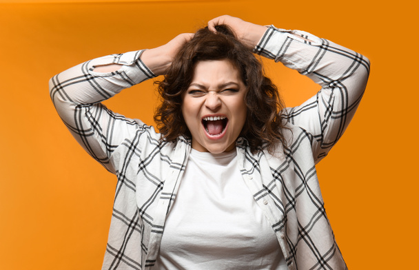 Stressed overweight woman on color background - Фото, изображение
