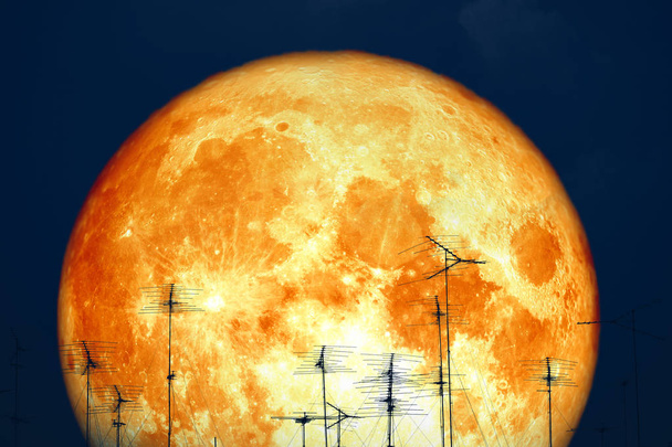 full milk blood moon back on silhouette antennas on night sky - Photo, Image