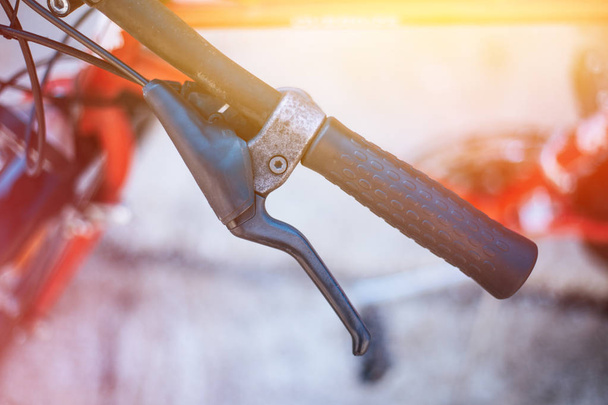 Bicycle handlebar and breaks, bike repair, blurred background - Φωτογραφία, εικόνα