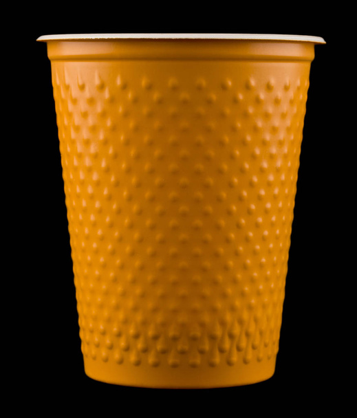 plastic cup isolated on black background close up - Photo, Image