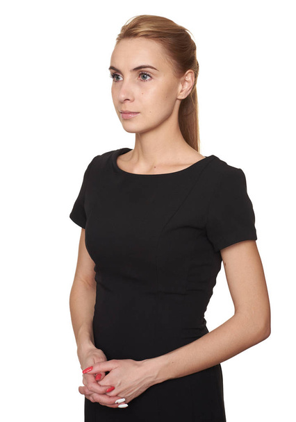 young pretty woman in black dress looking away isolated - Fotografie, Obrázek