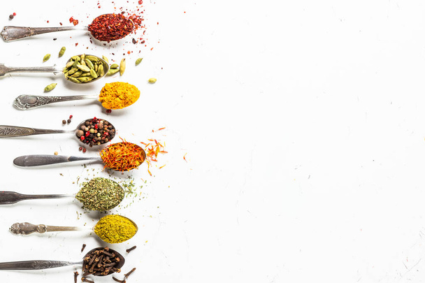 Set of indian spices in spoons on white - Photo, Image