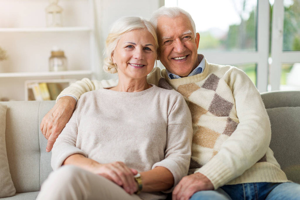 Happy senior couple at home - Фото, изображение