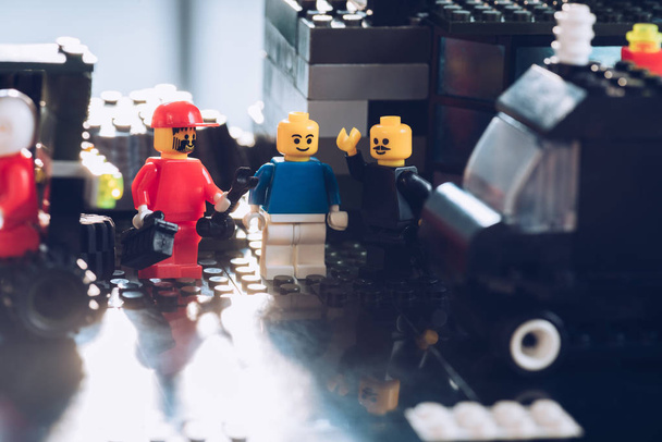 KYIV, UKRAINE - MARCH 15, 2019: lego minifigures working at service station with sunlight - 写真・画像