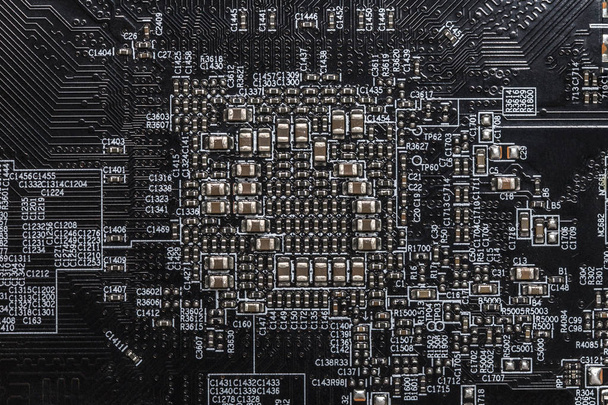 Carte mère PC / ordinateur portable noir avec circuits électroniques et micropuces. Contexte technologique
 - Photo, image