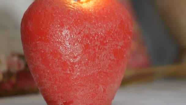 The decor. Panorama of a burning candle in the form of an apple. - Footage, Video