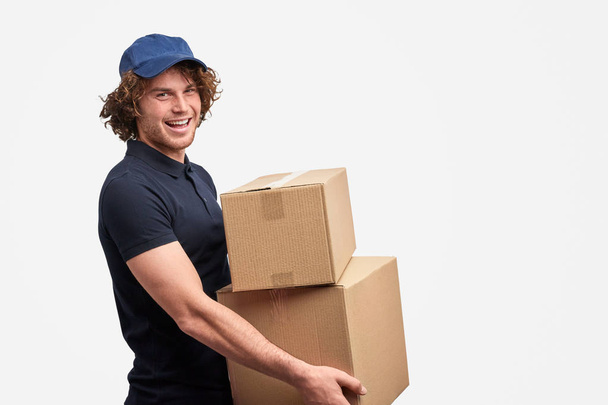 Cheerful courier of free shipping service - Foto, Imagem